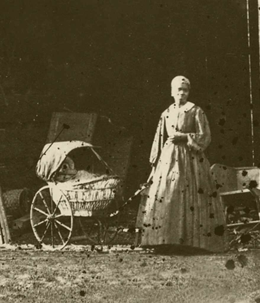 Detail of an (assumed) domestic servant from The University of Mississippi Carriage House collodion glass plate negative by Edward C. Boynton, a professor of chemistry, minerology, and geology from 1856–1861. Courtesy of the University of Mississippi Department of Archives and Special Collections.